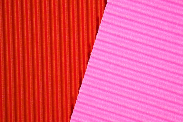 Textura de papel ondulado vermelho e rosa