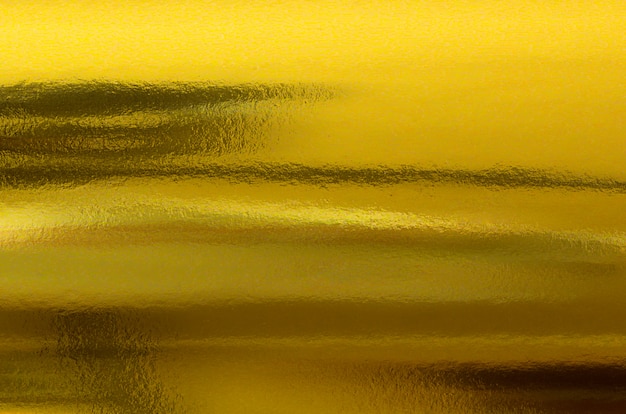 Textura de papel ouro. Fundo metálico da folha dourada abstrata.