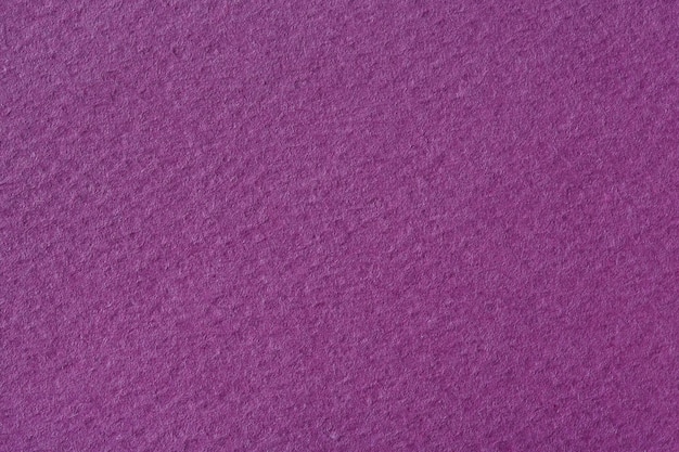 Textura de papel roxo grunge. Foto em alta resolução.