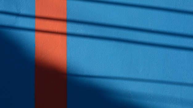 Foto textura de parede de cimento azul e laranja - fundo