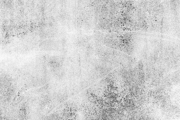 Textura de parede de cimento branca com mancha preta