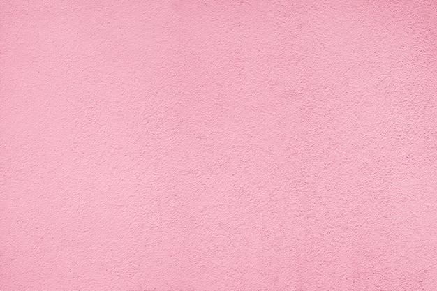 Foto textura de parede de cimento pela cor rosa