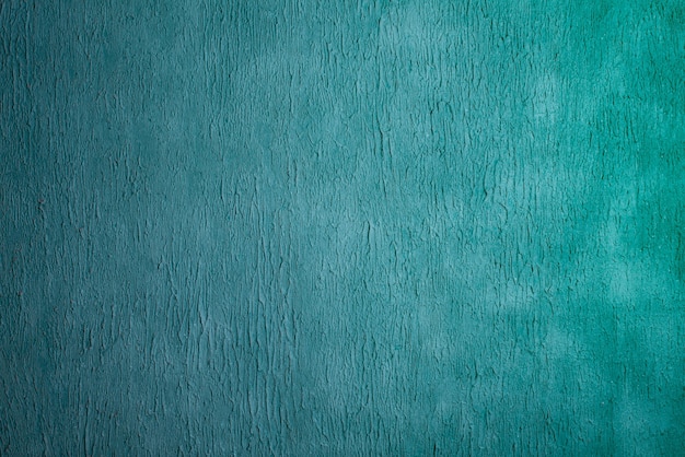 Textura de parede de estuque pintado de ciano azul claro decorativo grunge abstrato bonito.