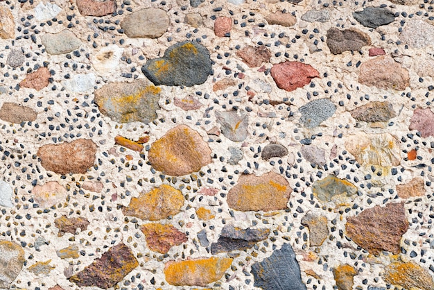 Textura de parede de pedra artesanal.