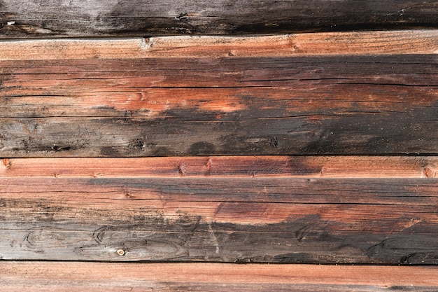 Textura de parede de prancha de madeira marrom, use como natural para o fundo.