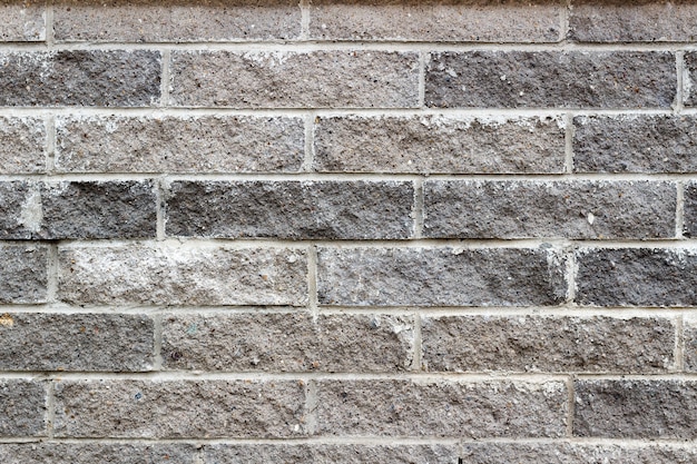 Textura de parede de tijolos de pedra cinza. Fundo abstrato de tijolo de pedra