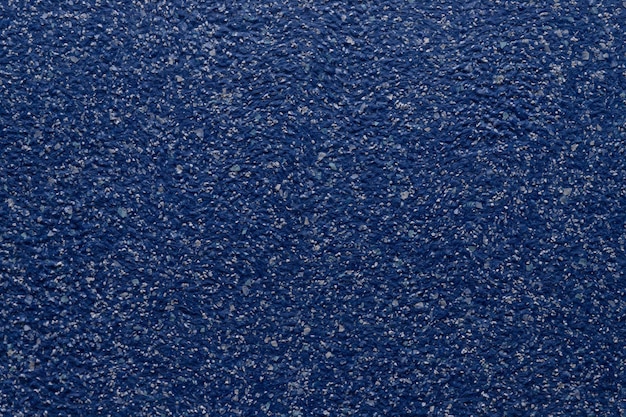 textura de parede granulada na cor azul, fundo de superfície