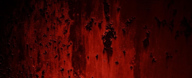 Textura de parede vermelha do Grunge. Fundo grunge vermelho escuro. Textura de cimento horroroso