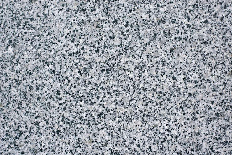 Foto textura de pedra escura natural com fundo de inclusões