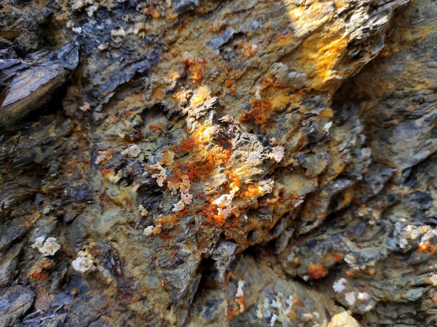 Textura de pedra geodésica A rocha é marrom e vermelha Fundo mineral Design de materiais naturais