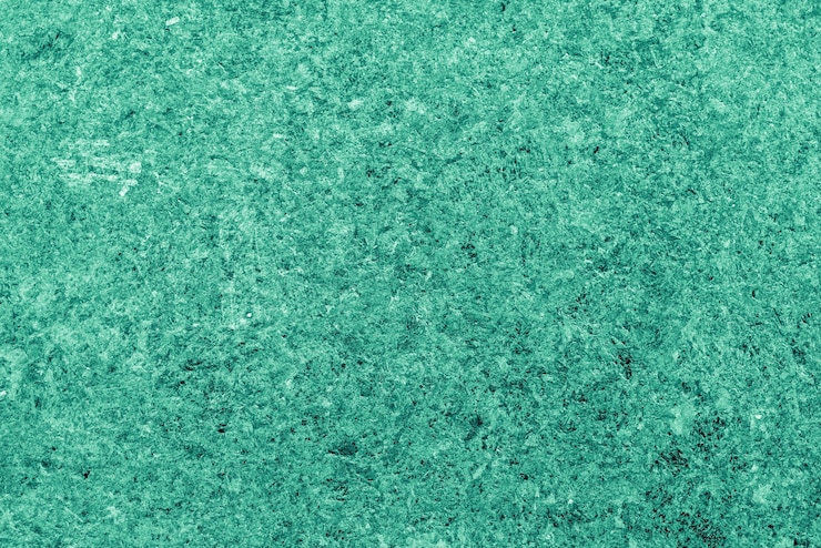 Foto textura de pedra verde natural. belos padrões de uma superfície de pedra. fundo mineral abstrato.
