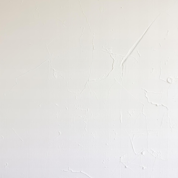 Foto textura de pintura áspera de parede de textura branca
