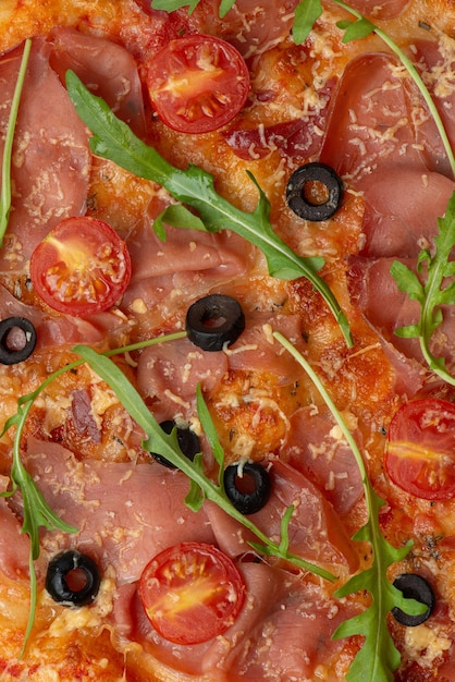 Textura de pizza com presunto e tomate