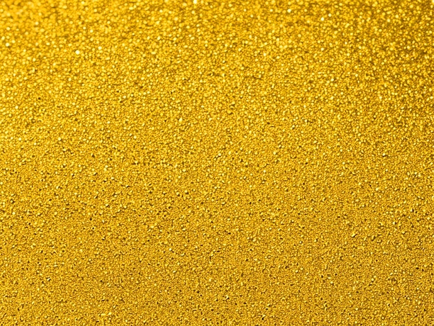 Textura de pó dourado com brilho hd imagem gratuita