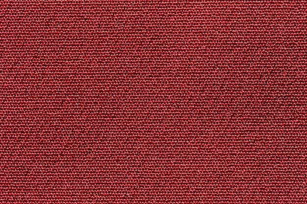 Textura de poliéster de pano de tecido de cor vermelha e fundo têxtil