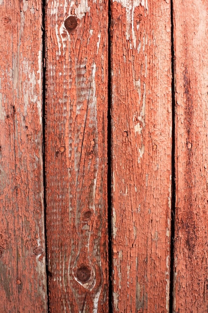 Textura de pranchas de madeira velhas. Restos de tinta velha na superfície de madeira pintada.