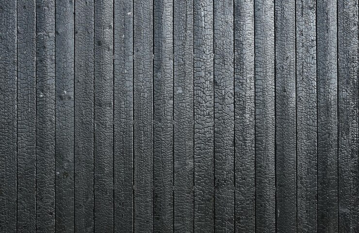 Foto textura de tábua de madeira queimada shosugiban yakisugi é um método tradicional japonês de preservação de madeira