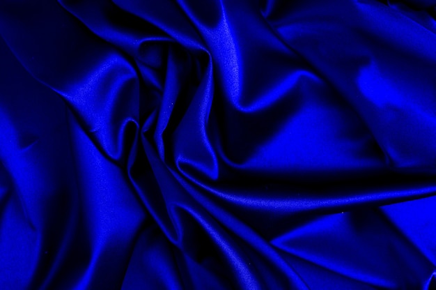 Textura de tecido azul amarrotado