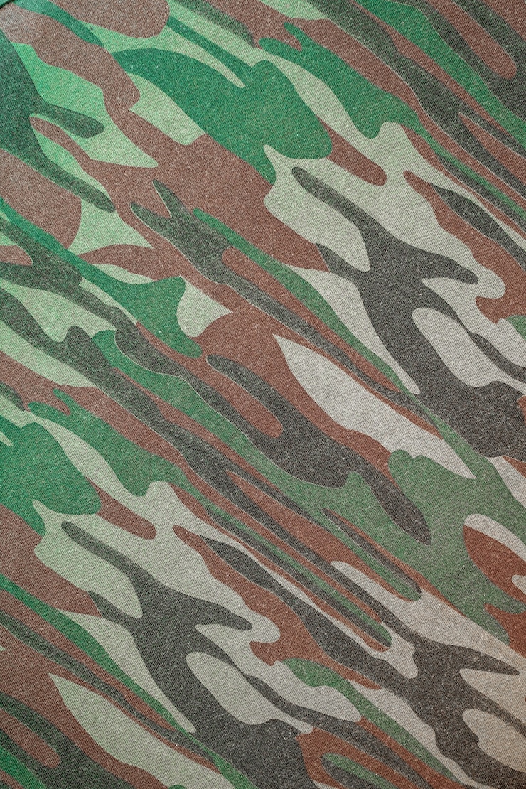 Foto textura de tecido de algodão camuflado verde marrom