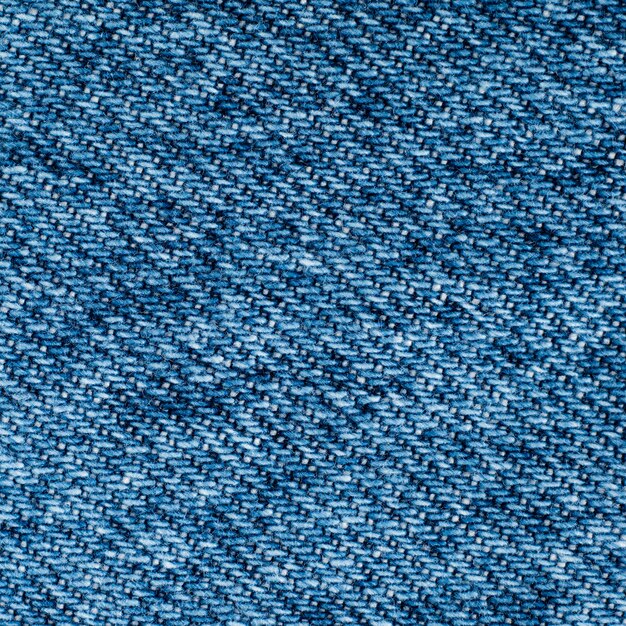 Textura de tecido de calça jeans azul fundo close-up moda