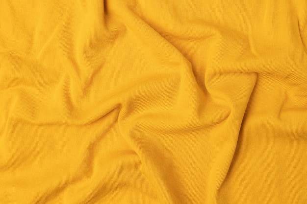 Foto textura de tecido de cetim amarelo