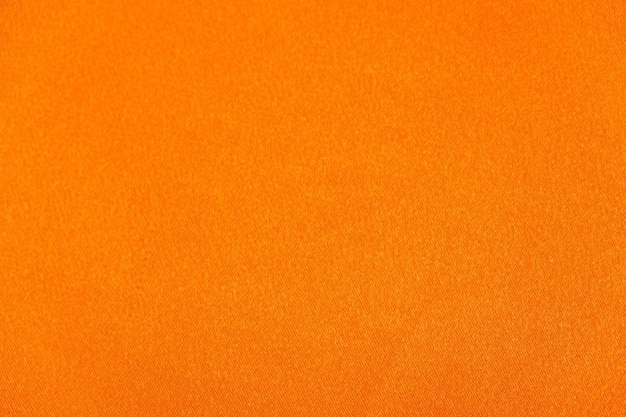 Textura de tecido de cetim laranja linda vista superior do padrão