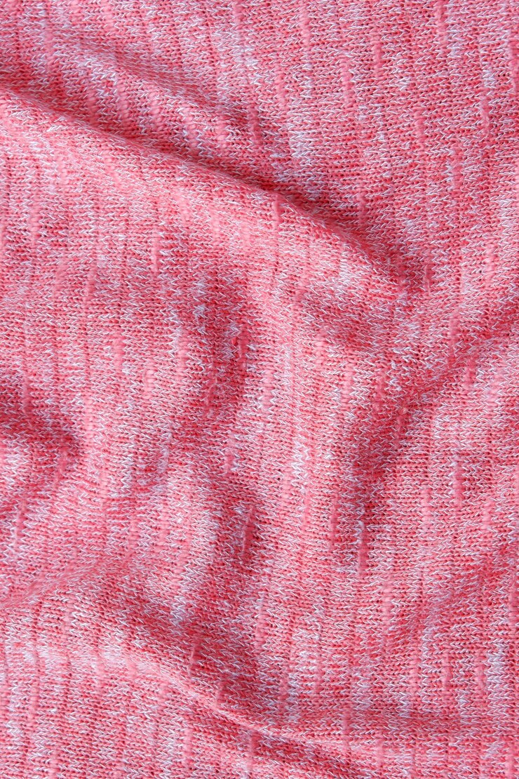 Textura de tecido de malha rosa sem costura com belo close up e fundo de detalhes de tecido elegante.