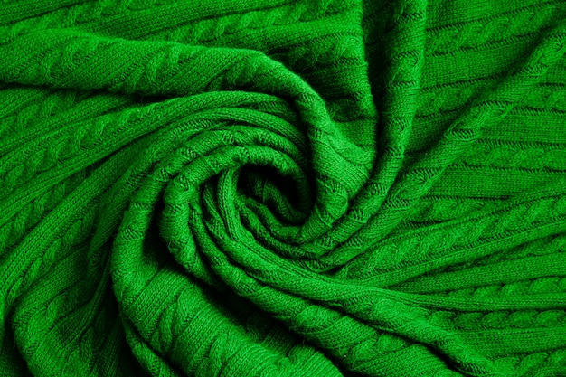 Textura de tecido de malha verde. abstrato de malha.