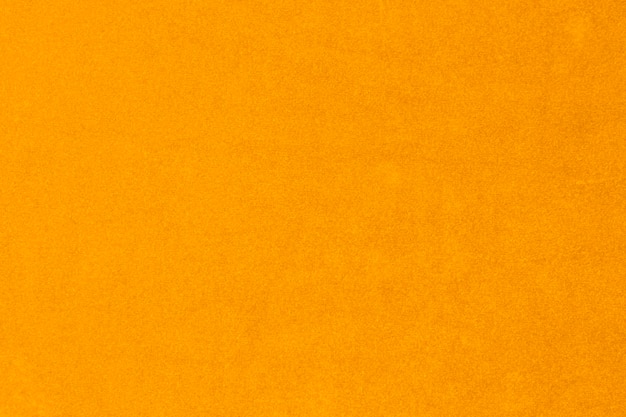 Foto textura de tecido de veludo amarelo usada como fundo de tecido violeta de material têxtil macio e liso há espaço para textx9