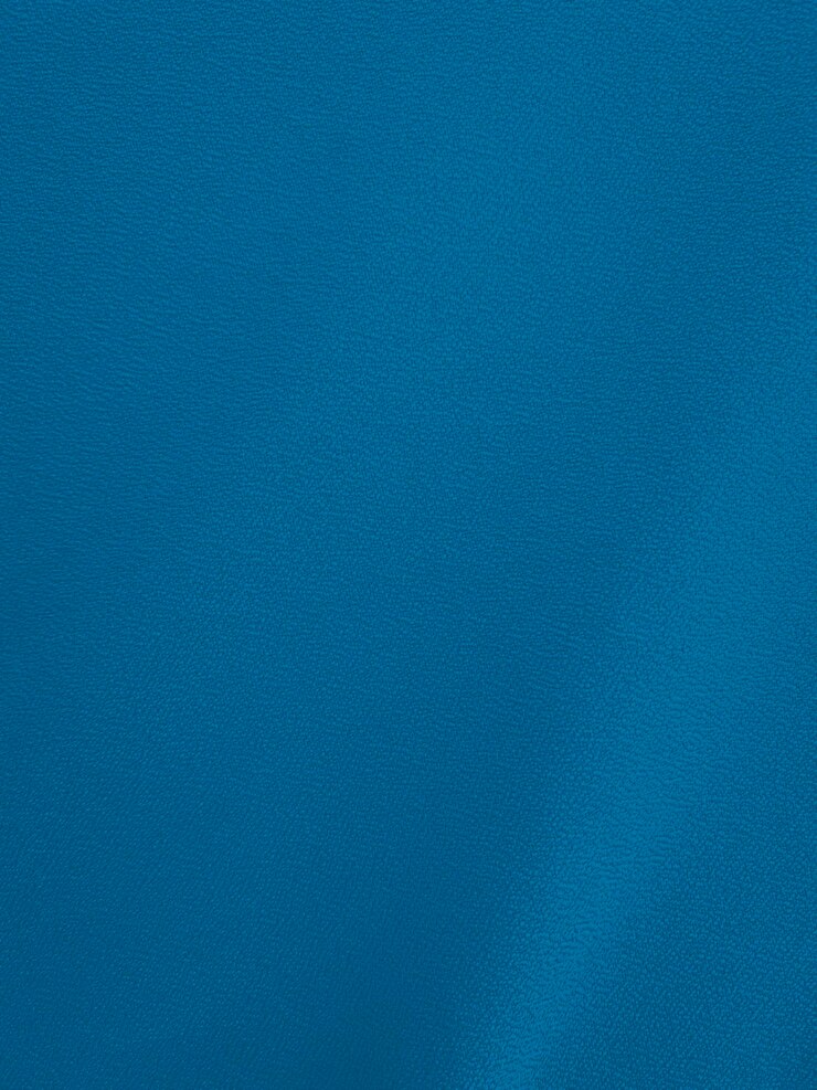 Textura de tecido de veludo azul claro usado como fundo Fundo de tecido azul claro vazio de material têxtil macio e liso Há espaço para texto