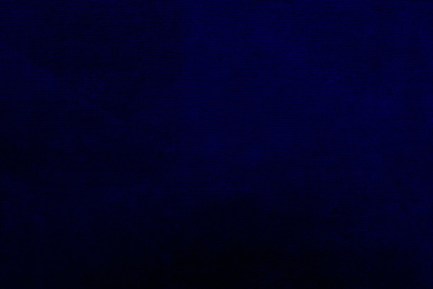 Textura de tecido de veludo azul escuro usado como plano de fundo Fundo de tecido azul escuro vazio de material têxtil macio e liso Há espaço para textx9
