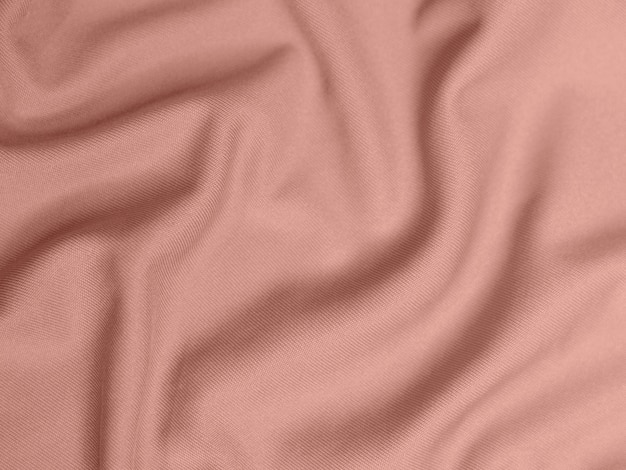 Textura de tecido de veludo cor de ouro rosa usada como fundo Fundo de tecido de ouro rosa vazio de material têxtil macio e liso Há espaço para texto