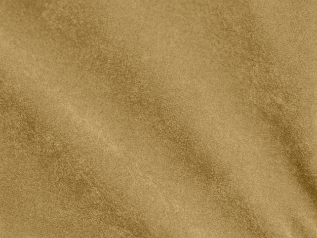 Textura de tecido de veludo de cor dourada usada como fundo de tecido de cor loira de material têxtil macio e liso Há espaço para texto