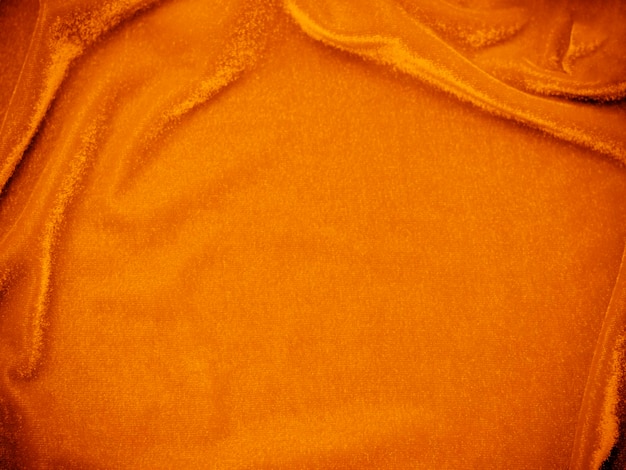 Textura de tecido de veludo laranja usada como fundo Fundo de tecido laranja vazio de material têxtil macio e liso Há espaço para textx9