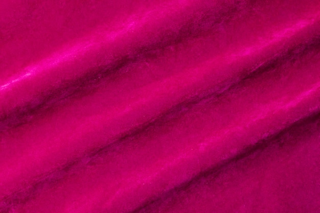 Textura de tecido de veludo rosa usada como fundo de tecido rosa de material têxtil macio e liso há espaço para textx9