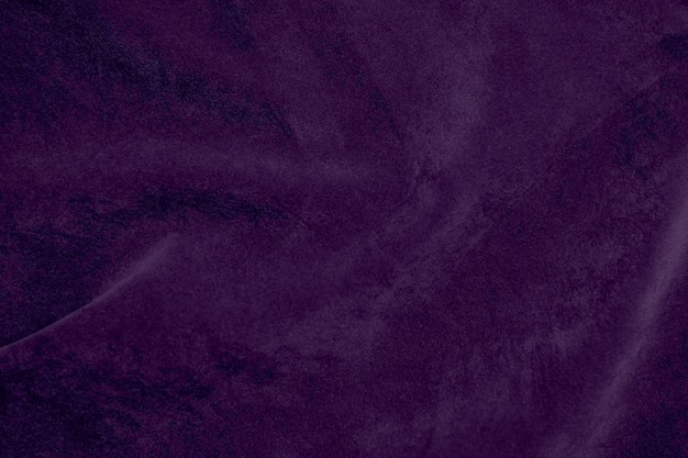 Foto textura de tecido de veludo roxo macio de seda usado como fundo tecido de cor lavanda fundo de material têxtil macio e liso veludo triturado luxo violeta tom suave para seda