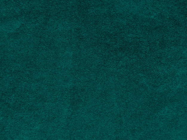 Textura de tecido de veludo verde escuro usado como fundo Fundo de tecido verde vazio de material têxtil macio e liso Há espaço para texto