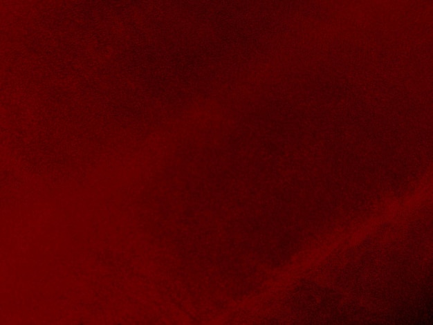 Textura de tecido de veludo vermelho usada como fundo Fundo de tecido vermelho vazio de material têxtil macio e liso Há espaço para texto