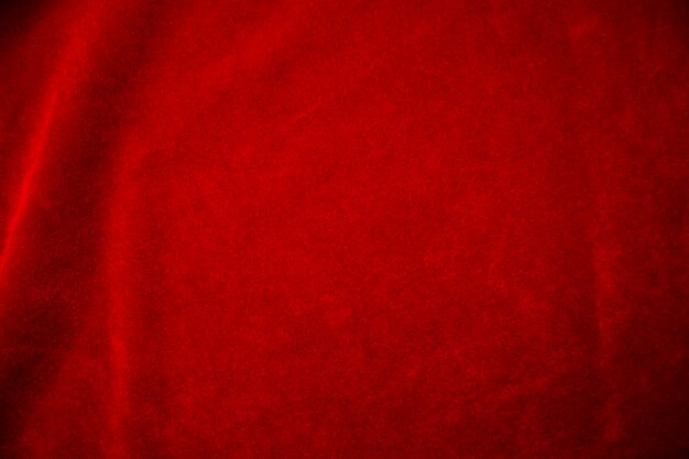 Textura de tecido de veludo vermelho usada como pano de fundo fundo de tecido vermelho de material têxtil macio e liso há espaço para textx9