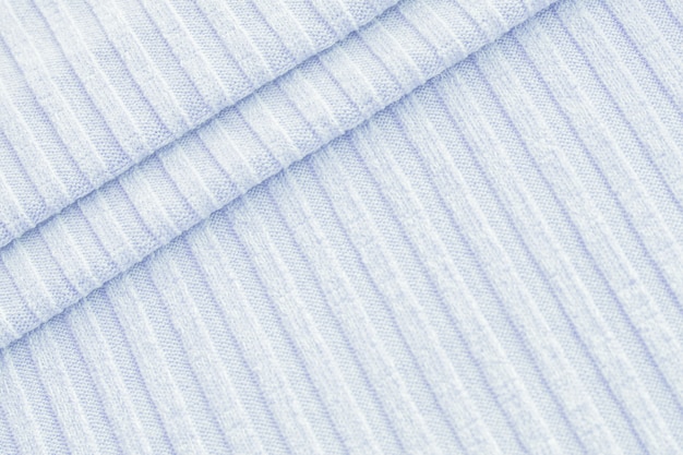 Textura de tecido é fundo de cor pastel, dobras onduladas de pano