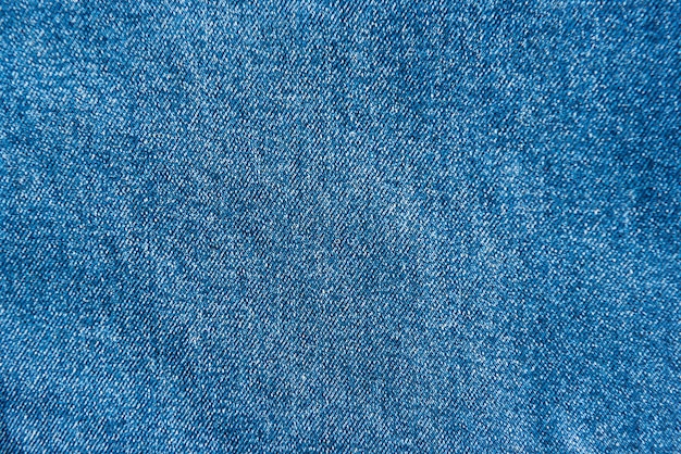 Textura de tecido jeans azul para plano de fundo e padrão