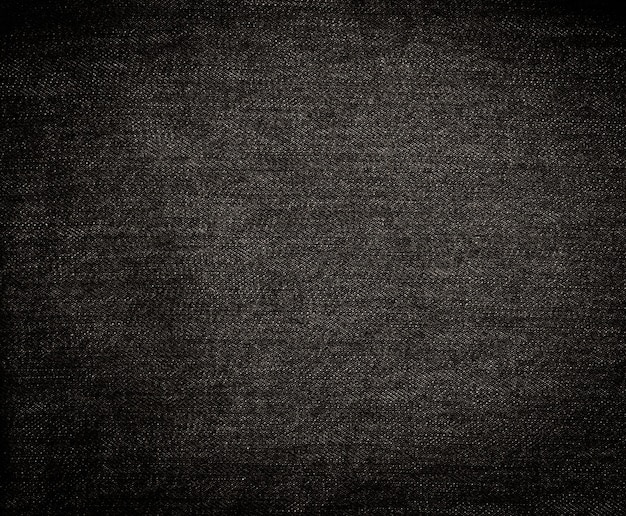Foto textura de tecido jeans preto close-up