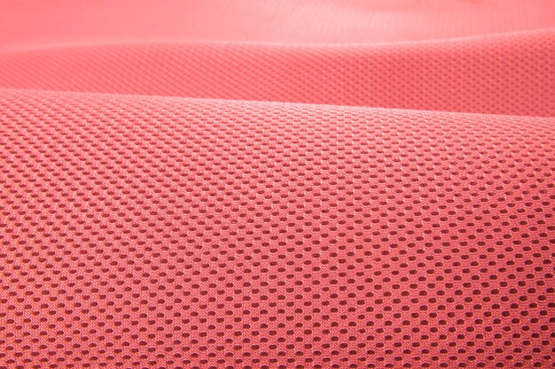 Foto textura de tecido vermelho áspero tecido de tricô de algodão materiais modernos de controle de temperatura flexíveis impermeáveis têxteis inteligentes multifuncionais close-up foco seletivo não rasga