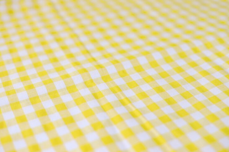 Foto textura de tecido xadrez amarelo sem costura para toalha de mesa de piquenique fundo geométrico abstrato