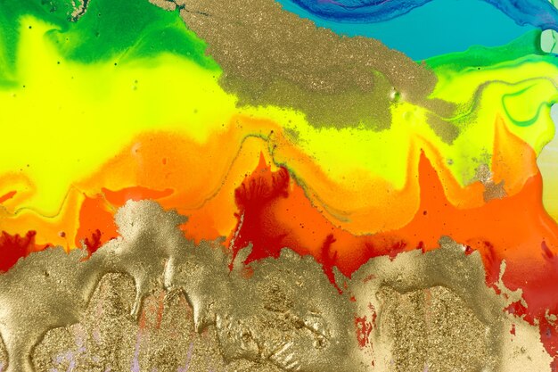 Textura de tinta mista de acrílico líquido arco-íris com pó de ouro