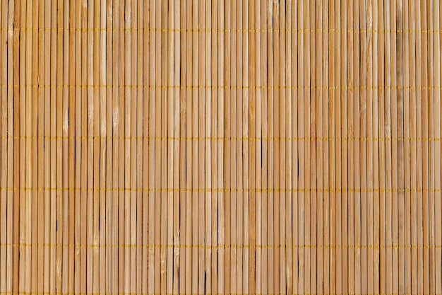 Textura de toalha de mesa de leves varas de bambu.