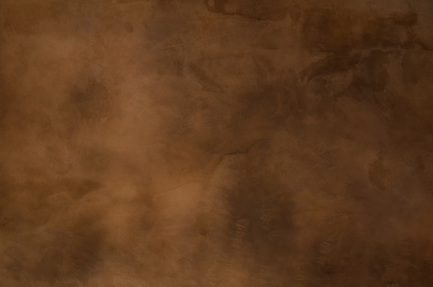 Foto textura de um concreto laranja marrom como fundo, parede marrom suja - ótimas texturas para o fundo