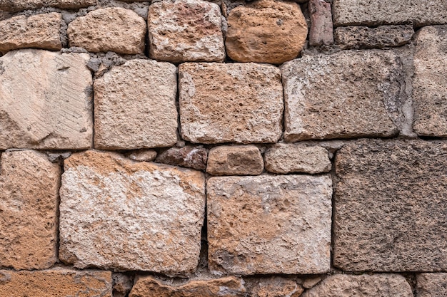 Textura de uma parede de pedra Parede de pedra como fundo ou textura Parte de uma parede de pedra para fundo