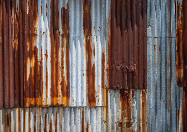 Textura enferrujada de parede de ferro galvanizado corrugado para o fundo