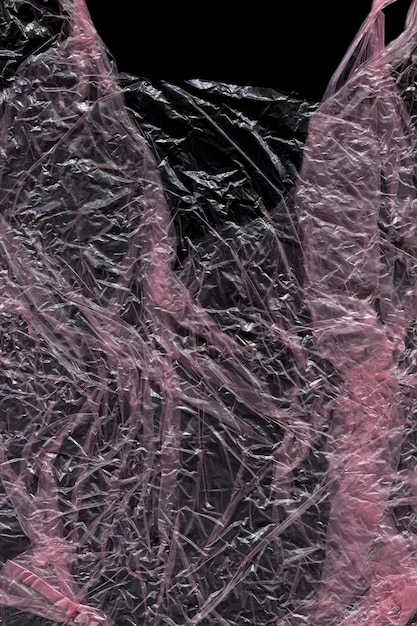 Foto textura de envoltura de envases de plástico sobre fondo negro